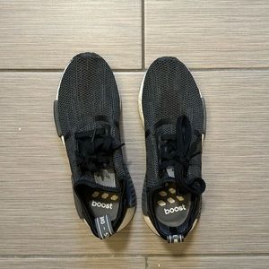 Black and Gray Adidas NMDs